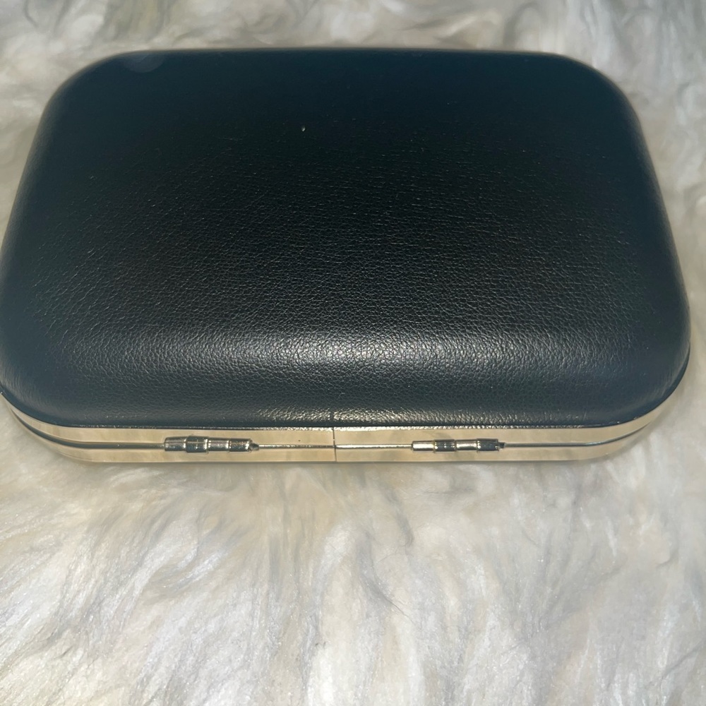 Daniel black clutch